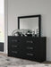 Signature Design by Ashley Maeling six-drawer dresser with sleek wood finish and modern hardware for bedroom storage.