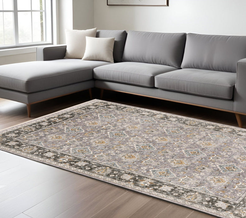 6' x 9' Oriental Power Loom Stain Resistant Area Rug With Fringe - Gray And Blue
