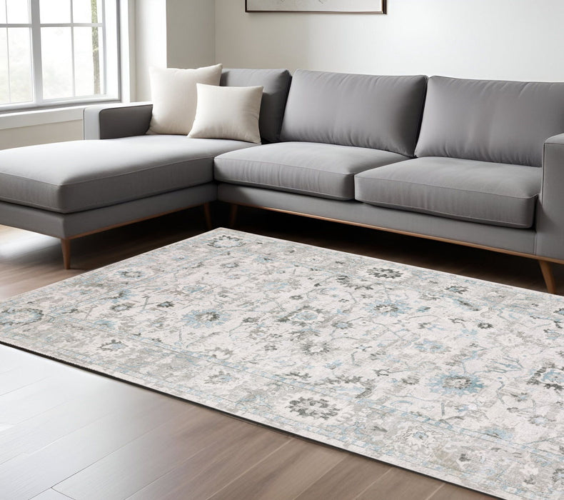 6' X 9' Oriental Hand Tufted Area Rug - Ivory And Teal