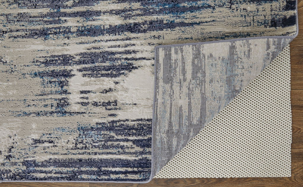 7' x 10' Abstract Power Loom Distressed Area Rug - Tan Blue And Ivory