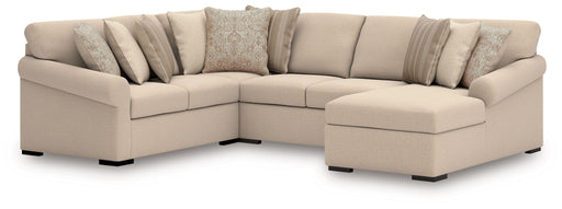 Benchcraft LadyMae 4-piece stationary sectional sofa with plush cushions and modern design, shown in a cozy living room setting.