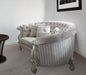 Ivory velvet curved floral sofa with gray legs and matching toss pillows, stationary home furniture by HomeRoots
