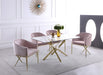 Modern Xander dining table by Meridian Furniture with a sleek wooden surface and sturdy legs, perfect for contemporary dining spaces.