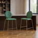 Set of two green velvet and gold steel bar height chairs from HomeRoots, featuring sleek design and modern bar stool style.