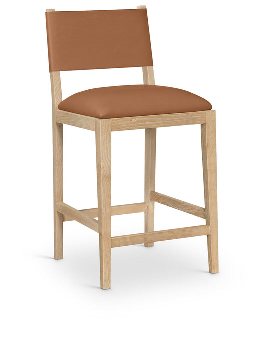 Avon vegan leather counter stool in natural finish, Meridian Furniture, 24-27 inch height with modern design and sturdy legs.