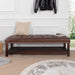 Giga upholstered end of bed bench with tufted design, nailhead trim, wooden shelf, and padded footstool for bedroom or living room.