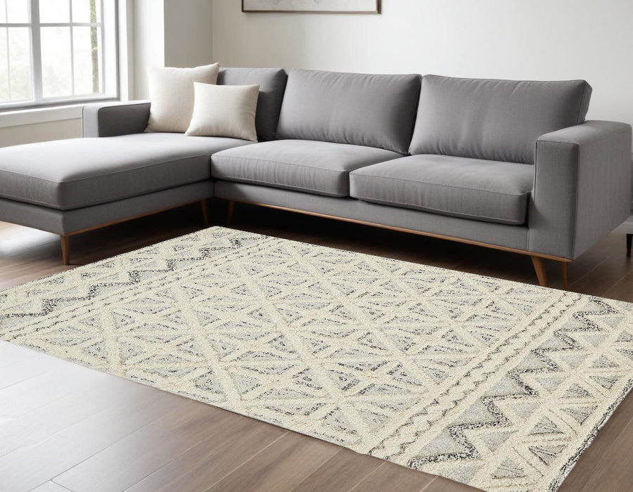 8' x 10' Wool Geometric Tufted Handmade Stain Resistant Area Rug - Ivory And Black