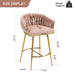 Set of two Giga pink counter height bar stools with wave back design, golden chromed base, and footrests for kitchen islands.