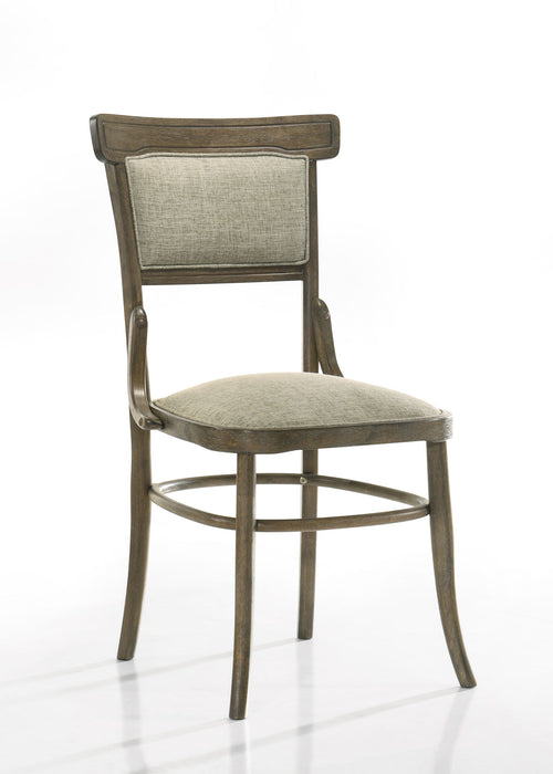 Set of two Giga Bistro wide dining chairs with cushions in vintage walnut finish, showcasing sturdy wood frames and comfortable seating.