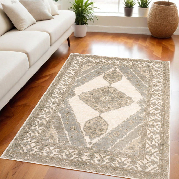 5.3' x 7.6' Oriental Power Loom Area Rug - Beige And Ivory