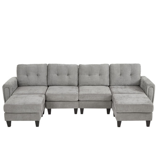Giga 3-piece modular sectional sofa with movable ottomans, built-in USB ports, and side tables in a modern living room setting.