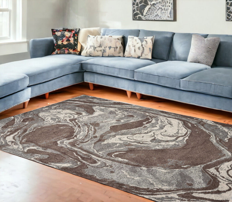 7' x 10' Polypropylene Area Rug - Mocha