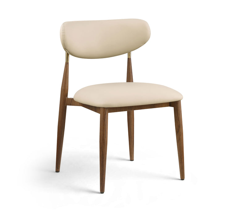 Vegan leather upholstered dining side chair with walnut wood legs, modern design, by Meridian Furniture.