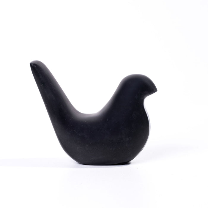 Black marble bird statue sculpture by TOV Furniture, detailed figurine with smooth finish on a pedestal.