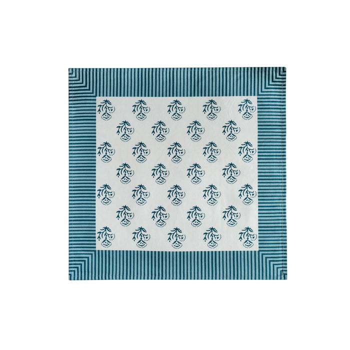 Set of four TOV Furniture Crissy cotton canvas napkins with blue vintage floral print, ideal for table setting and decor.