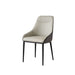 Set of 2 Giga modern dining chairs with upholstered seats, steel metal legs, black and gray tones for kitchen or living room.