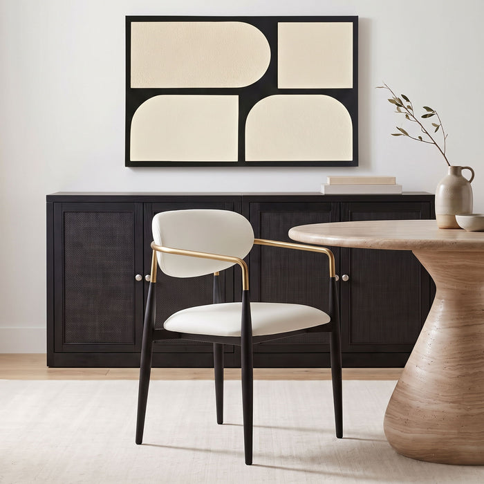Meridian Furniture Ronda vegan leather upholstered dining arm chair with black legs, showcasing a modern, comfortable seating design.