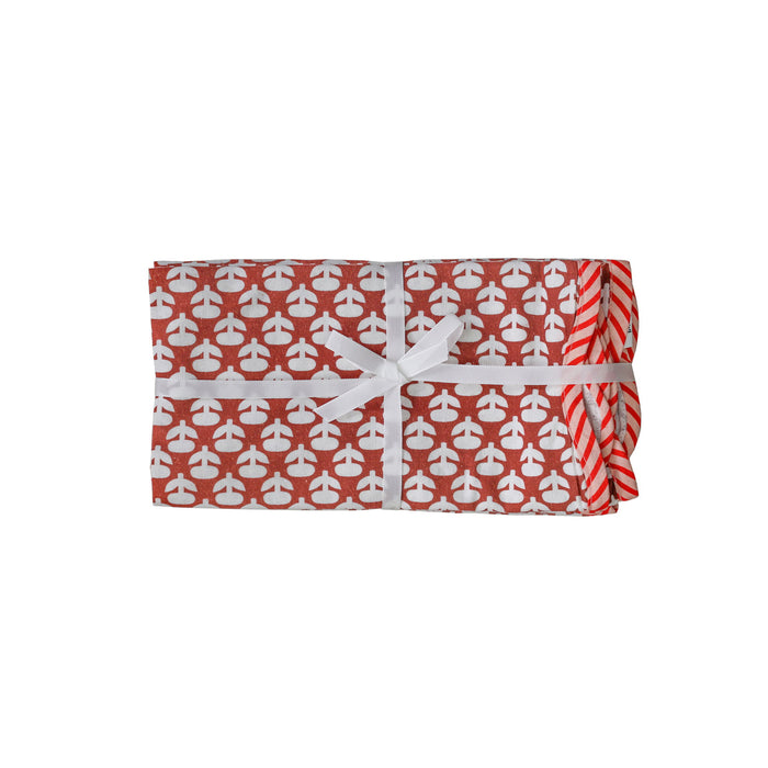 Set of four TOV Furniture Crissy cotton canvas napkins with vintage rust floral print, perfect for table decor.