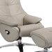 Gray tufted genuine leather manual swivel recliner with matching ottoman, featuring plush cushioning and sturdy metal base for comfort.