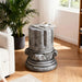 Giga antique gray round outdoor end table for patio and garden, stylish side table with a sturdy metal frame and textured surface.