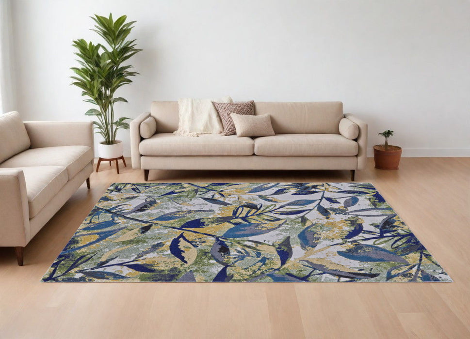10' x 13' Floral Power Loom Worn Faded Area Rug - Green Blue And Ivory