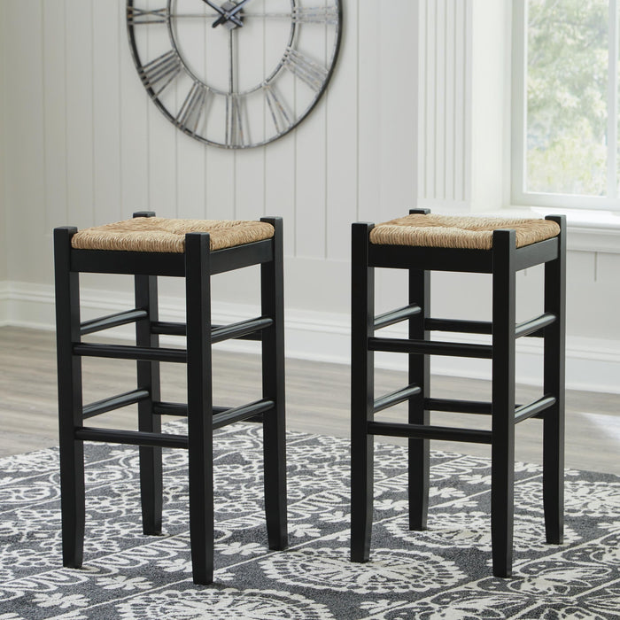 Set of two Ashley Furniture Mirimyn tall stools with wooden legs and upholstered seats, ideal for kitchen or bar areas.