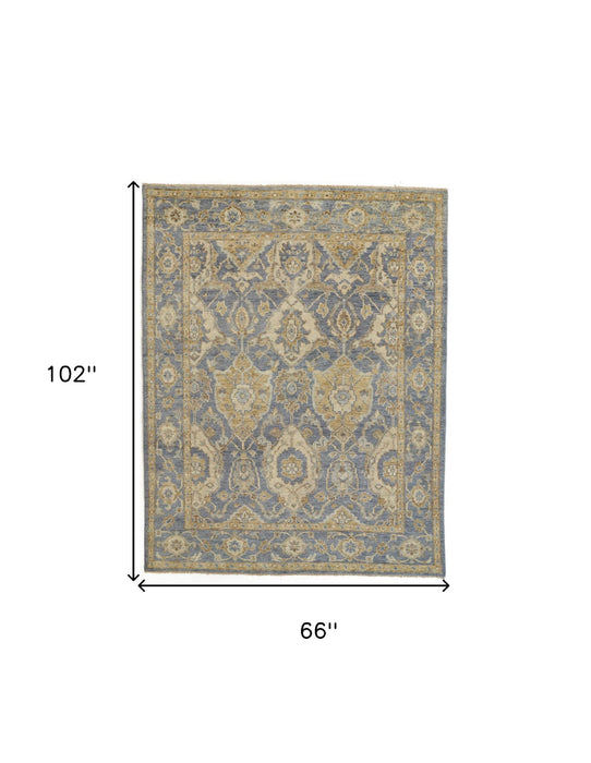 5' x 8' Wool Floral Hand Knotted Stain Resistant Area Rug With Fringe - Blue Gold And Tan