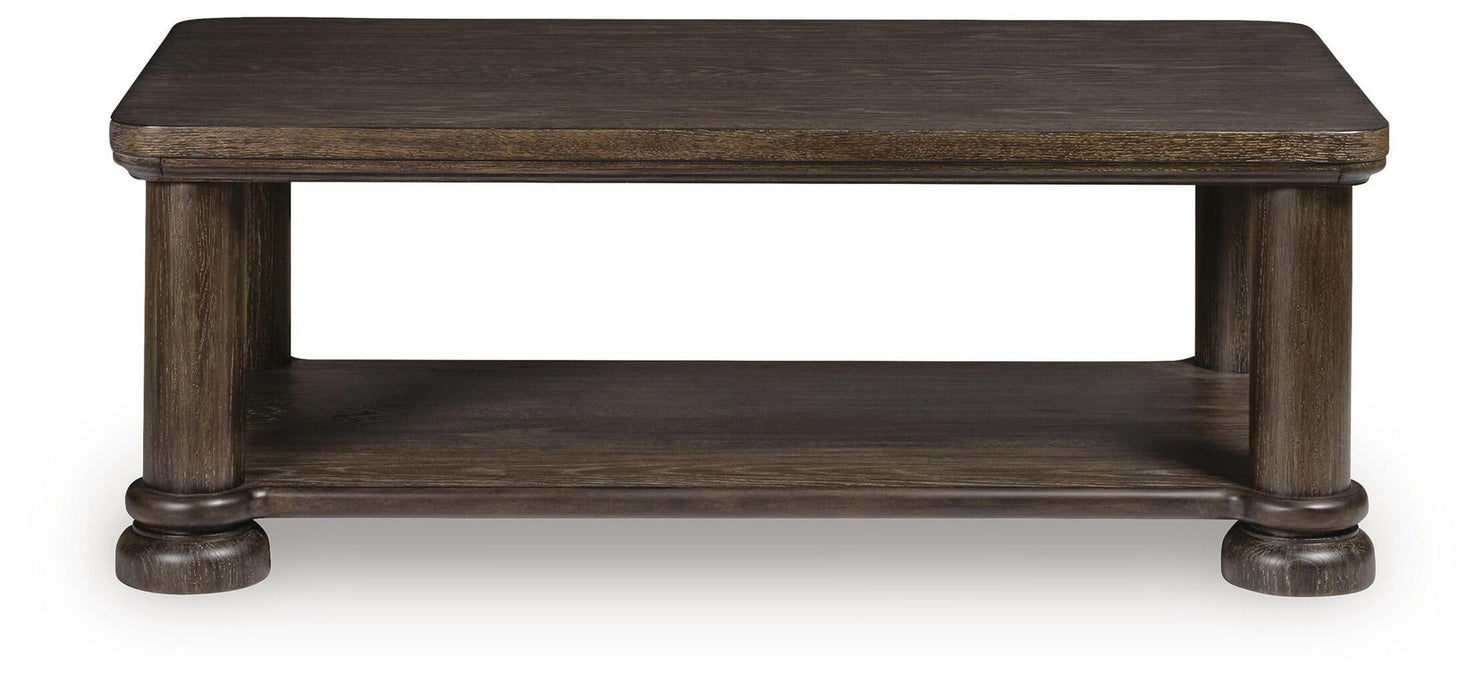 Rectangular cocktail table from Signature Design by Ashley, featuring a sleek surface and sturdy legs for modern living spaces.