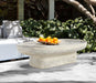 Indoor/outdoor Meridian Furniture Tivoli coffee table with travertine concrete top and sleek modern design.