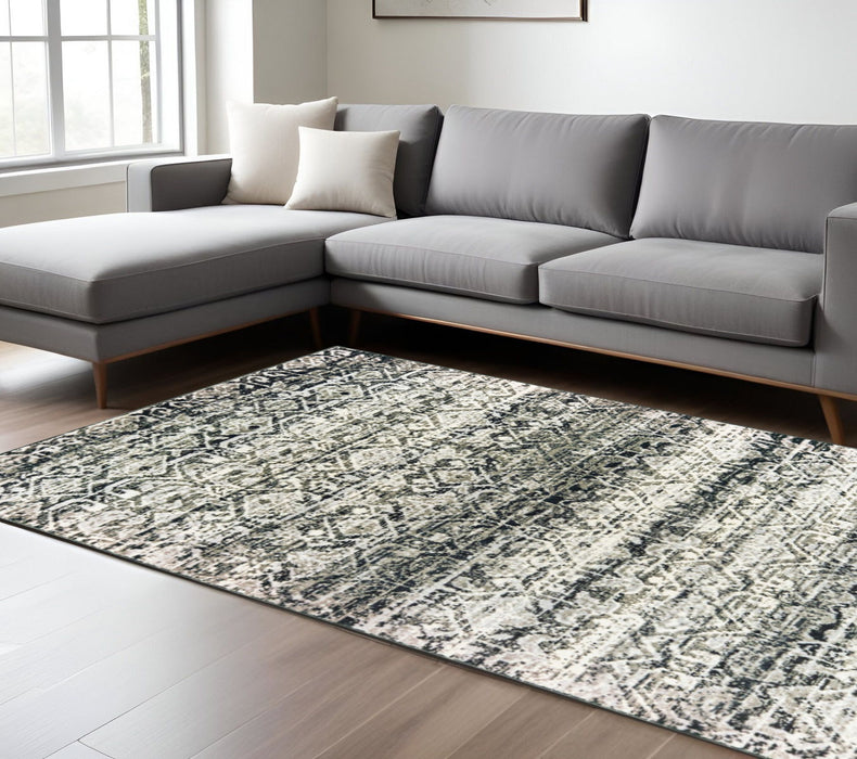 6.6' x 9.5' Geometric Power Loom Stain Resistant Area Rug - Grey And Ivory