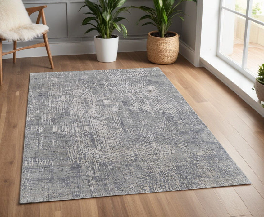 4' x 6' Casual Abstract Hand Woven Worn Faded Area Rug - Gray