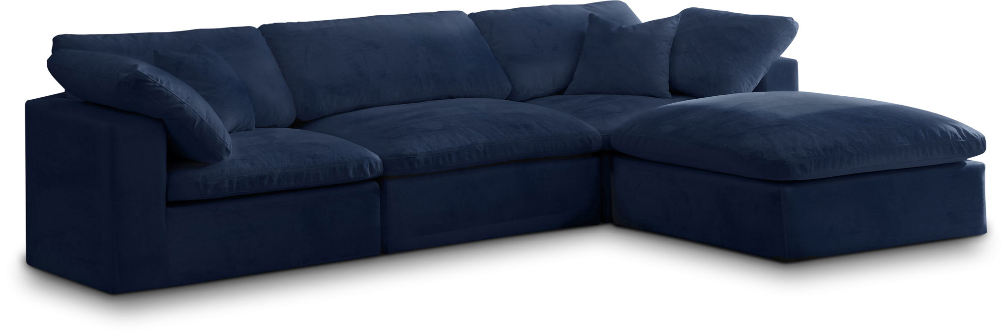 Cozy Meridian Furniture 4-piece modular sectional with chaise, featuring plush cushions and contemporary design in a living room setting.