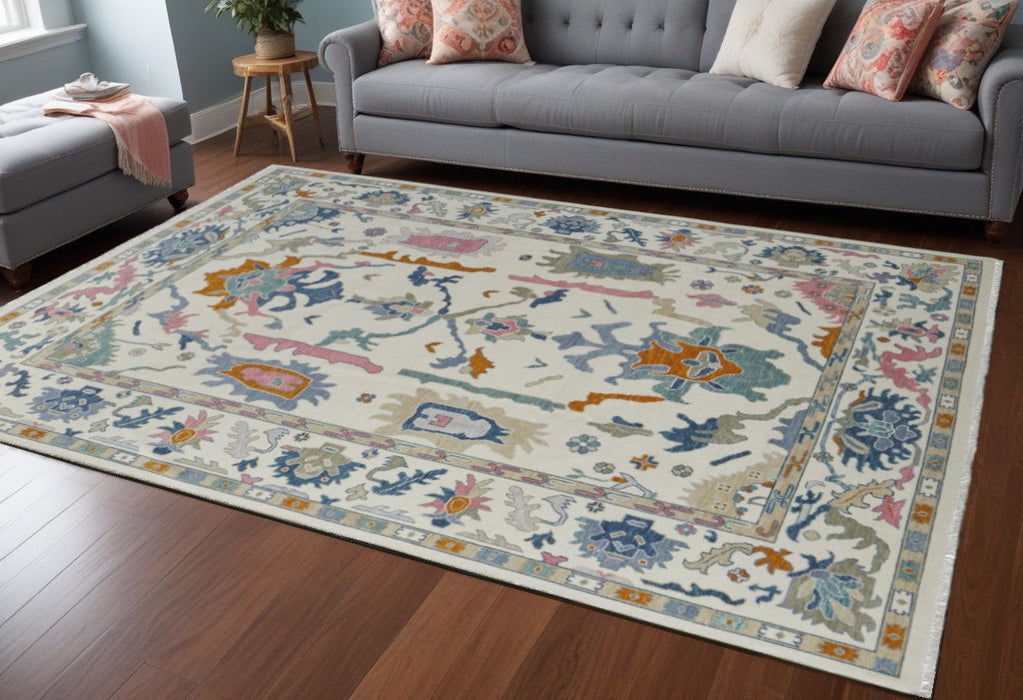 8' x 10' Wool Floral Hand Knotted Area Rug With Fringe - Blue Ivory And Pink