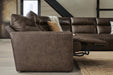 Benchcraft® ModZ 7-piece power reclining sectional sofa with plush cushions and reclining seats in a modern living room setting.