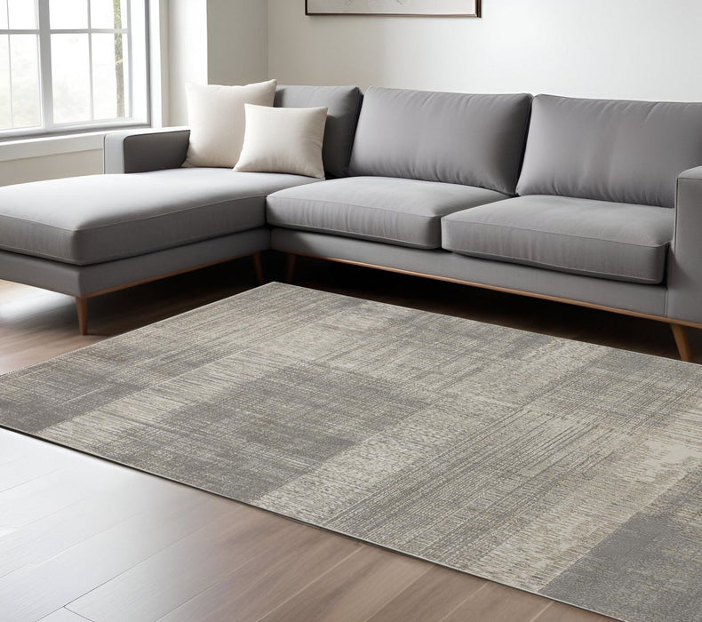 7' x 10' Abstract Stain Resistant Area Rug - Gray And Ivory