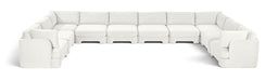 Velvet upholstered 10-piece stationary sectional sofa by Meridian Furniture, featuring plush cushions and modern design.