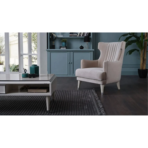 Bellona Gravita accent chair with modern design, featuring a plush upholstered seat and sleek wooden legs.