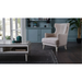 Bellona Gravita accent chair with modern design, featuring a plush upholstered seat and sleek wooden legs.