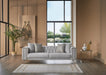 Bellona Montego accent chair with plush upholstery and wooden legs, showcasing a modern design in a cozy living space.