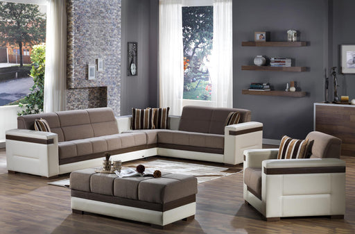 Bellona Moon armchair with plush fabric and modern design, featuring a rounded shape and cozy cushioning.