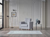 Bellona Parma armchair with plush fabric upholstery and modern design, featuring a comfortable cushioned seat and stylish armrests.