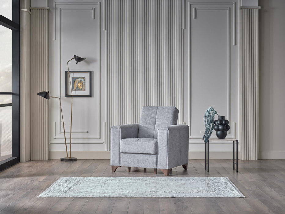 Bellona Parma armchair with plush fabric upholstery and modern design, featuring a comfortable cushioned seat and stylish armrests.