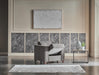 Bellona Parma armchair with plush upholstery and wooden legs, showcasing a modern and comfortable design.