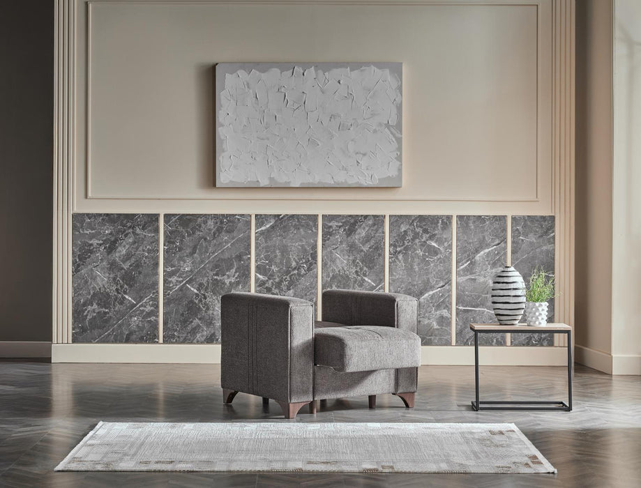 Bellona Parma armchair with plush fabric upholstery and wooden legs, showcasing a modern, comfortable seating design.