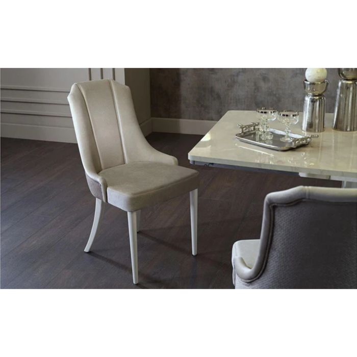 Pair of Bellona Gravita 6315 dining chairs with sleek design and wooden legs, perfect for modern dining room decor.