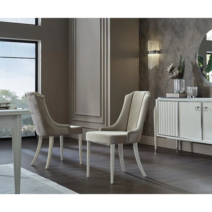 Bellona Gravita dining room set with expandable table, six chairs, buffet, and mirror in a stylish dining area.