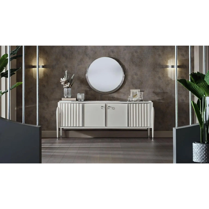 Bellona Gravita dining room set featuring an expandable table, six chairs, a buffet, and a mirror for elegant dining space.