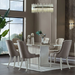 Bellona Gravita dining room set including expandable table, six chairs, buffet, and mirror, perfect for elegant dining spaces.