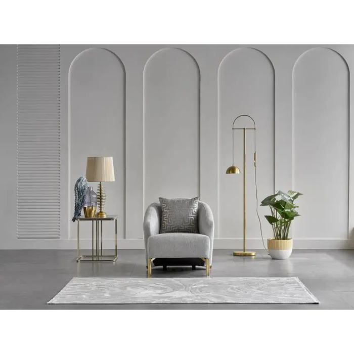 Bellona Monroe living room set with sofa and armchair, featuring plush cushions and modern design in a cozy living space.