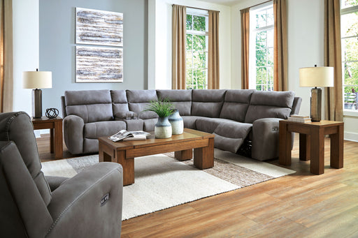 Signature Design by Ashley Durapella 7-piece living room sectional set with reclining seats and plush fabric in a modern layout.